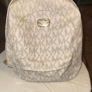 Michael Kors Logo Patterned Backpack in Cream
